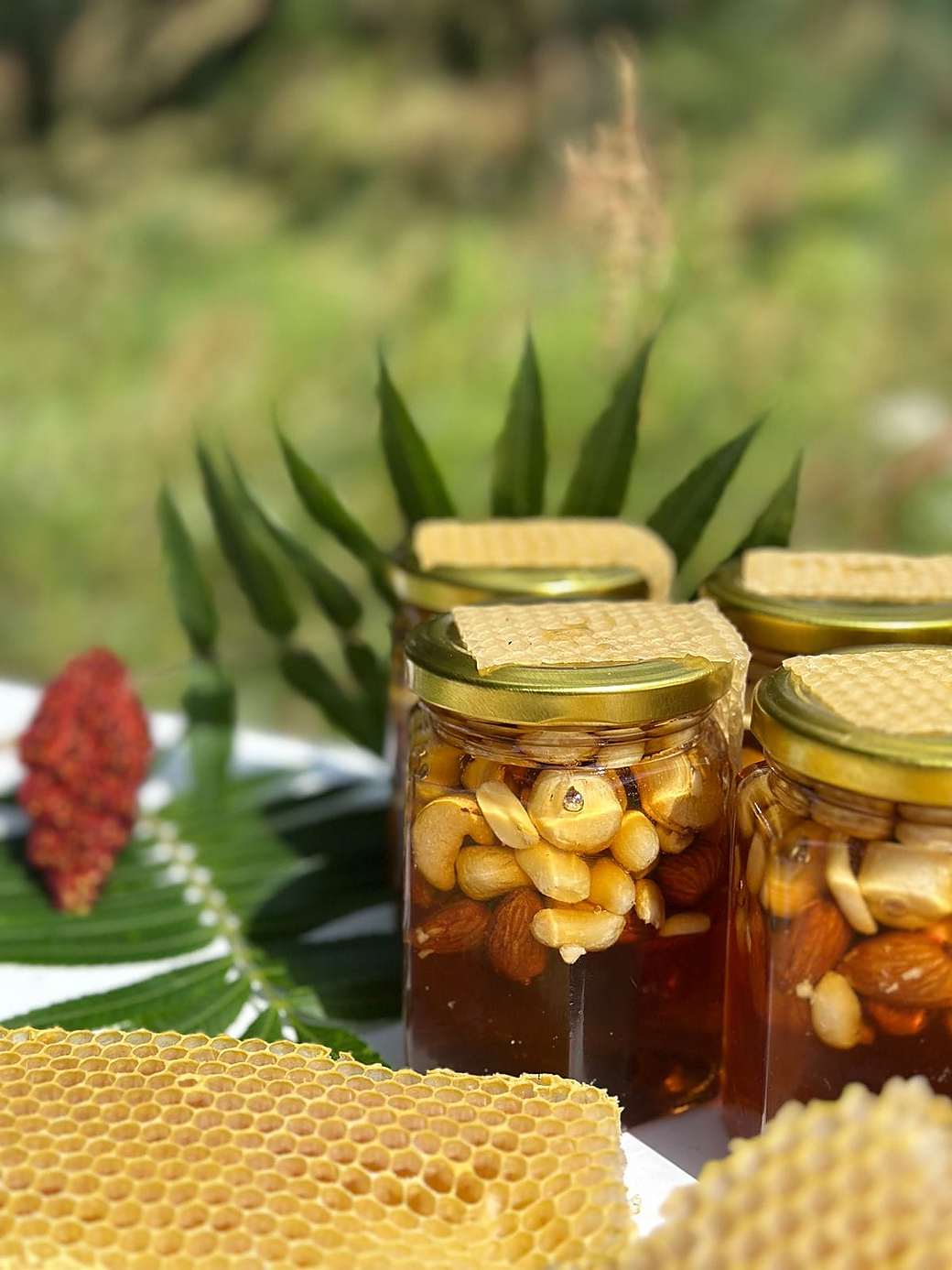 Golden honeycomb and a jar of raw island honey